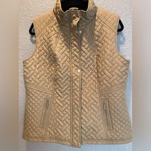 Weatherproof fur line vest for women.